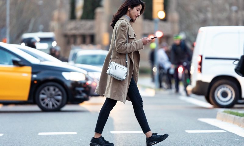 Nearly a third of Brits glued to phones while crossing the road