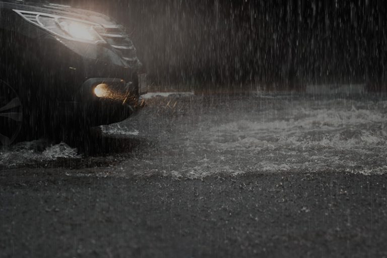 Heavy rain on the road at night